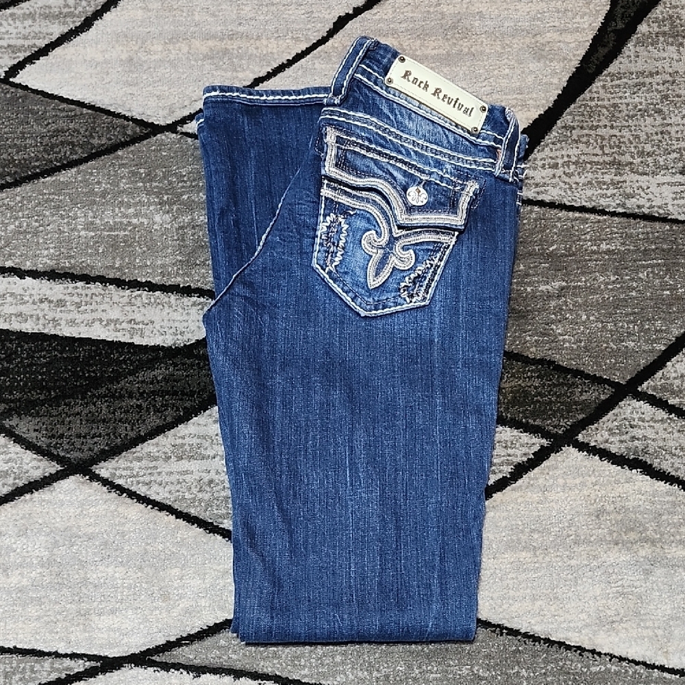 ROCK REVIVAL KAI EMBROIDERED FLEUR-DE-LIS METALLIC EASY-FIT DENIM BOOT JEAN